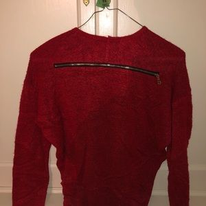 Red sweater with zipper on back